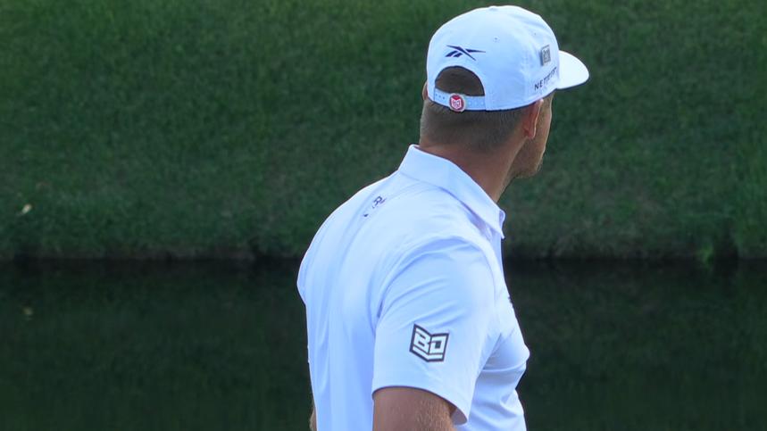 Bryson DeChambeau hypes up the crowd after birdie on 16