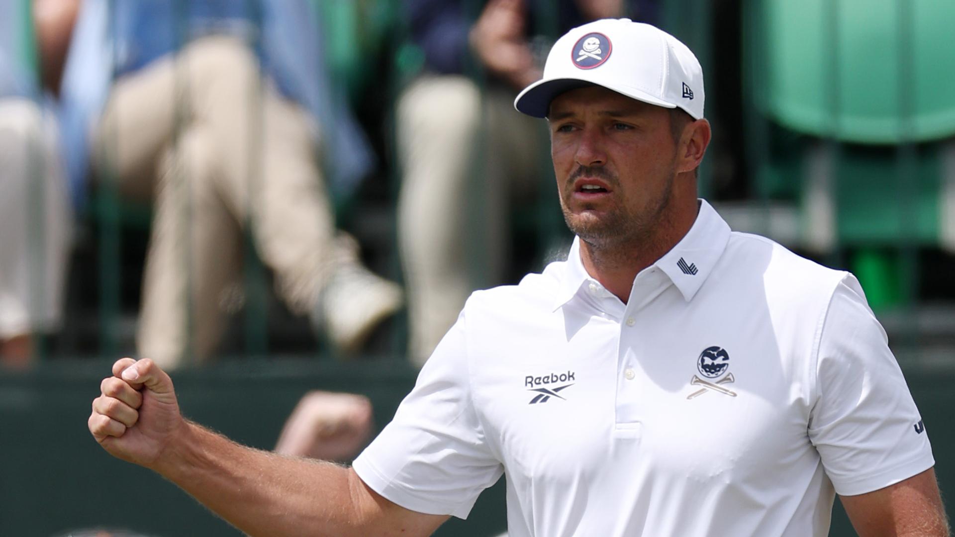 DeChambeau hears a roar after a birdie putt on Hole 1