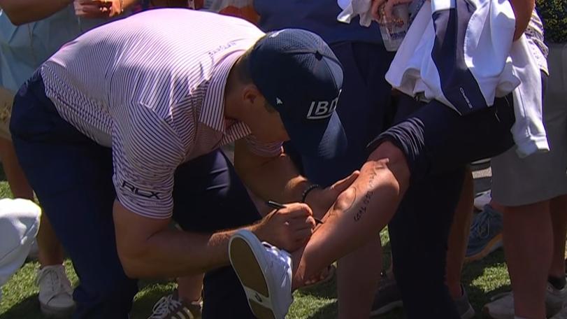 Billy Horschel signs fan's leg after hitting her with drive