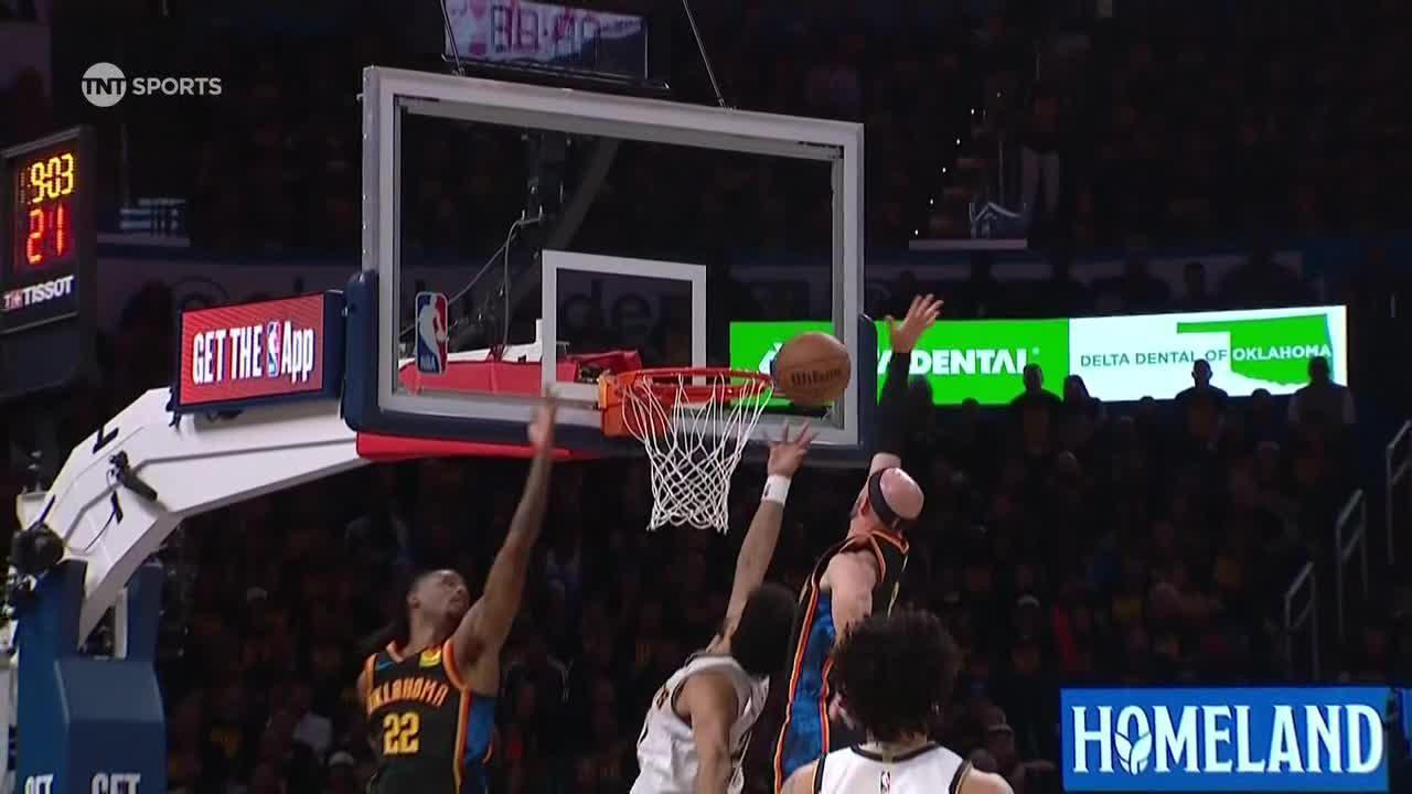 Caruso swats Murray's shot off the backboard