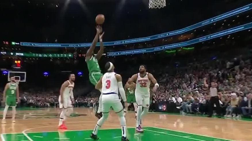 Brown attacks the paint and drains jumper over Hart