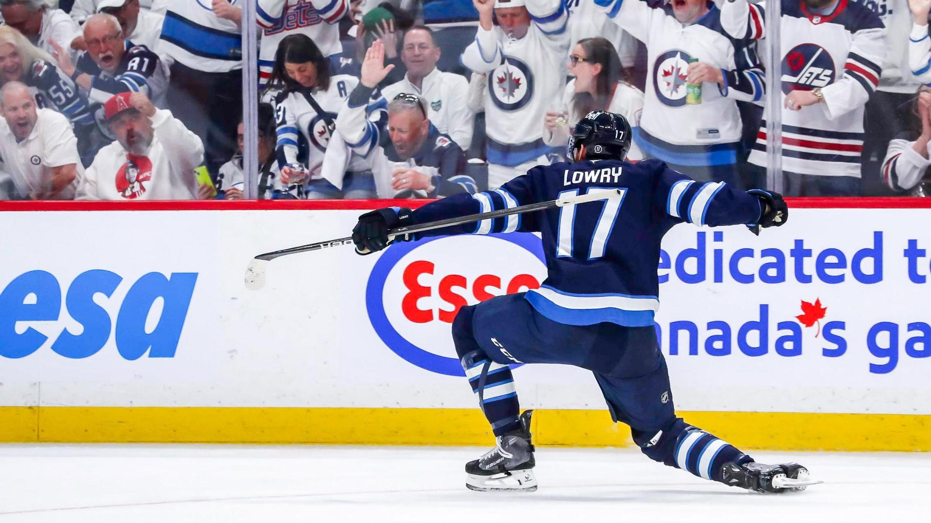 Adam Lowry scores off the boards for Jets