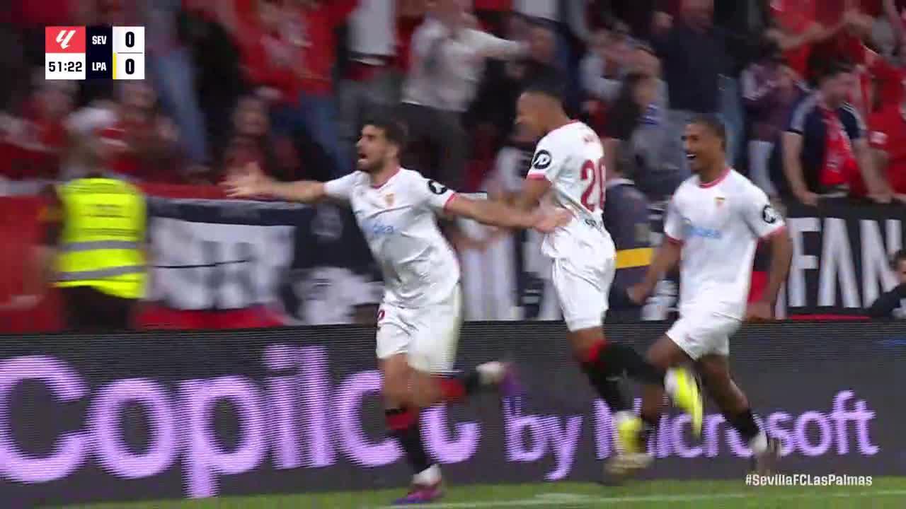 García Pascual slots in the goal for Sevilla