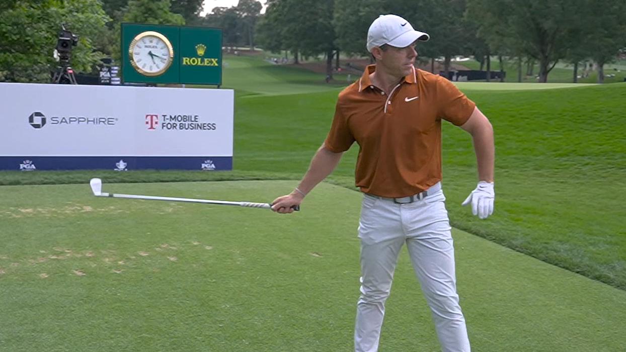 Rory flings his club after tee shot rolls off the green