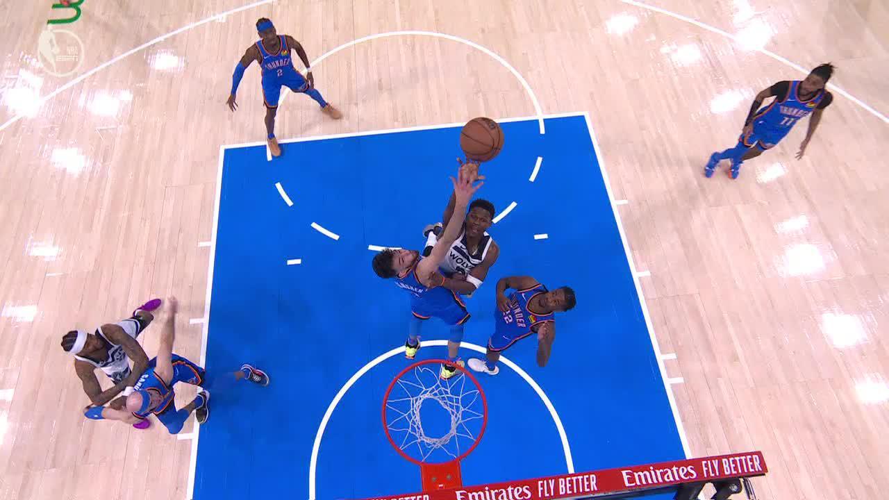 Anthony Edwards buries a hook shot over Chet Holmgren