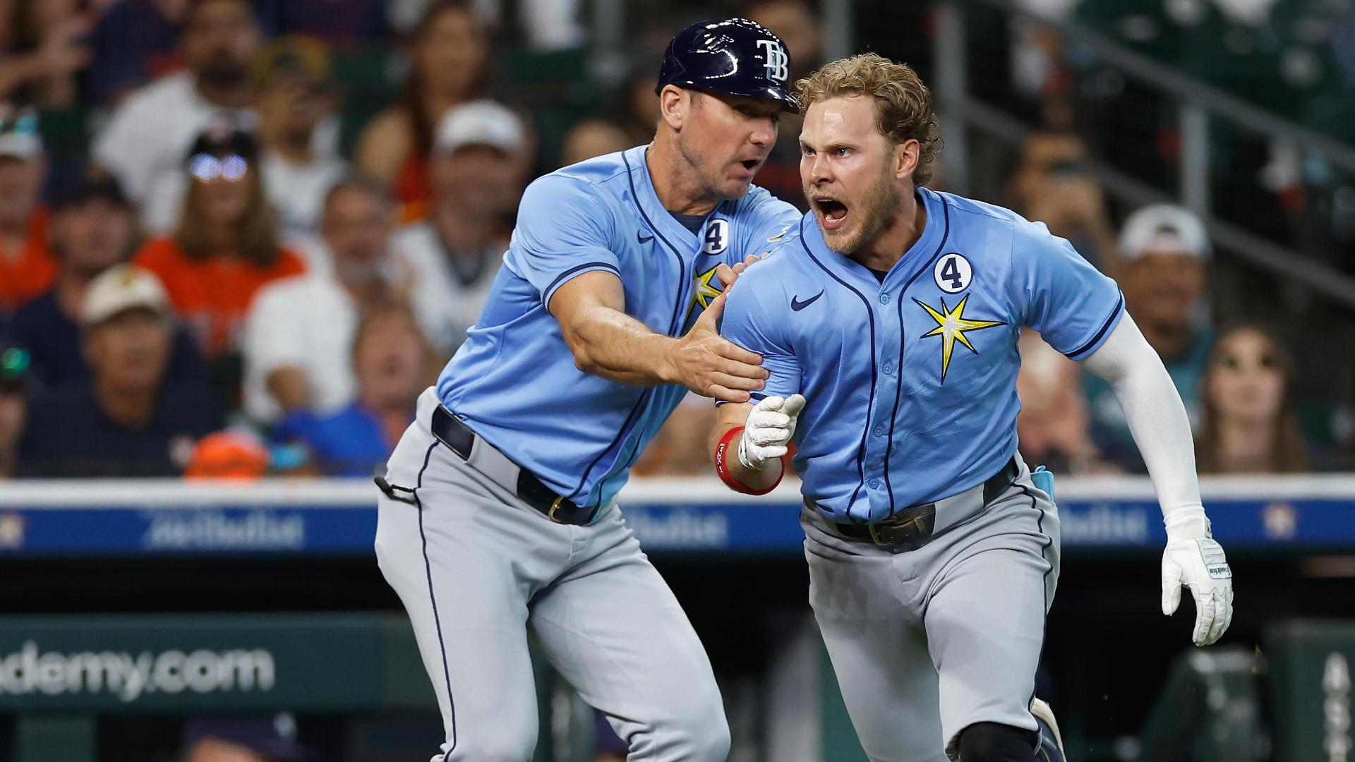 Taylor Walls has to be held back from umpire after getting ejected