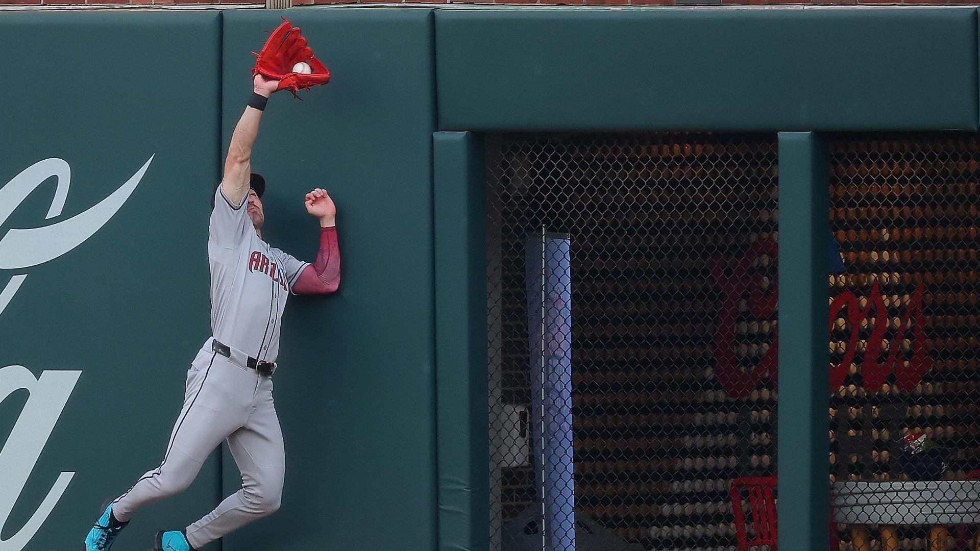 Corbin Carroll leaps to rob Ronald Acuna Jr. of extra bases