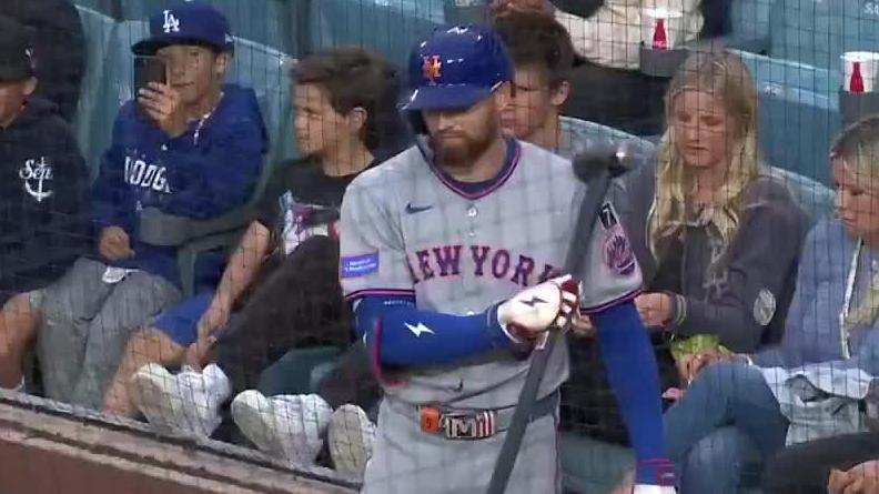 Brandon Nimmo warms up on deck with ... a sledgehammer?