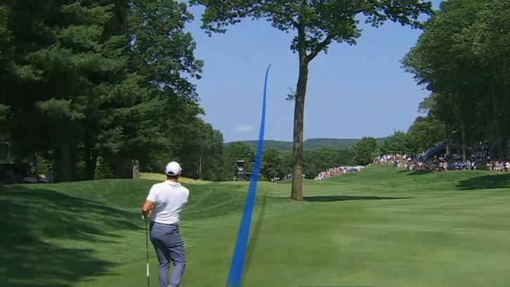 Rory McIlroy goes around a tree to set up a nice birdie
