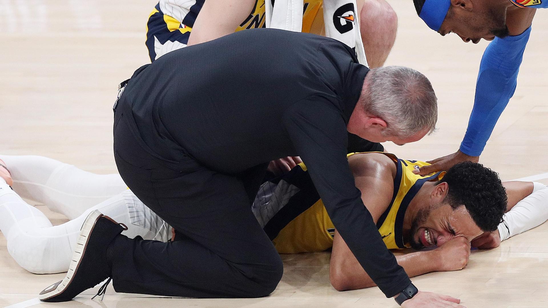 Tyrese Haliburton helped off court after Achilles injury