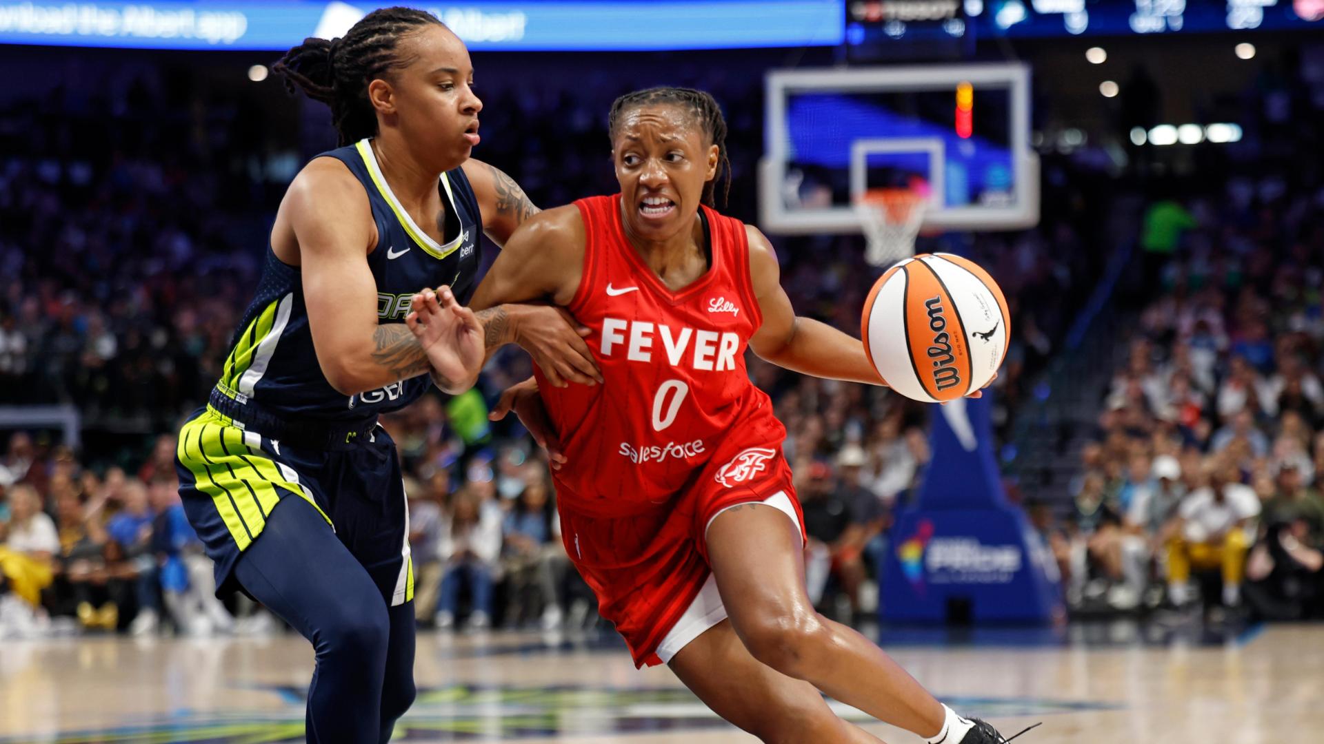 Kelsey Mitchell drops 32 in a nail-biting win over Wings