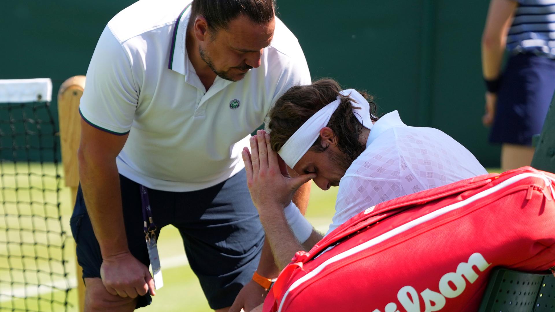 Tsitsipas retires from Wimbledon match due to back injury