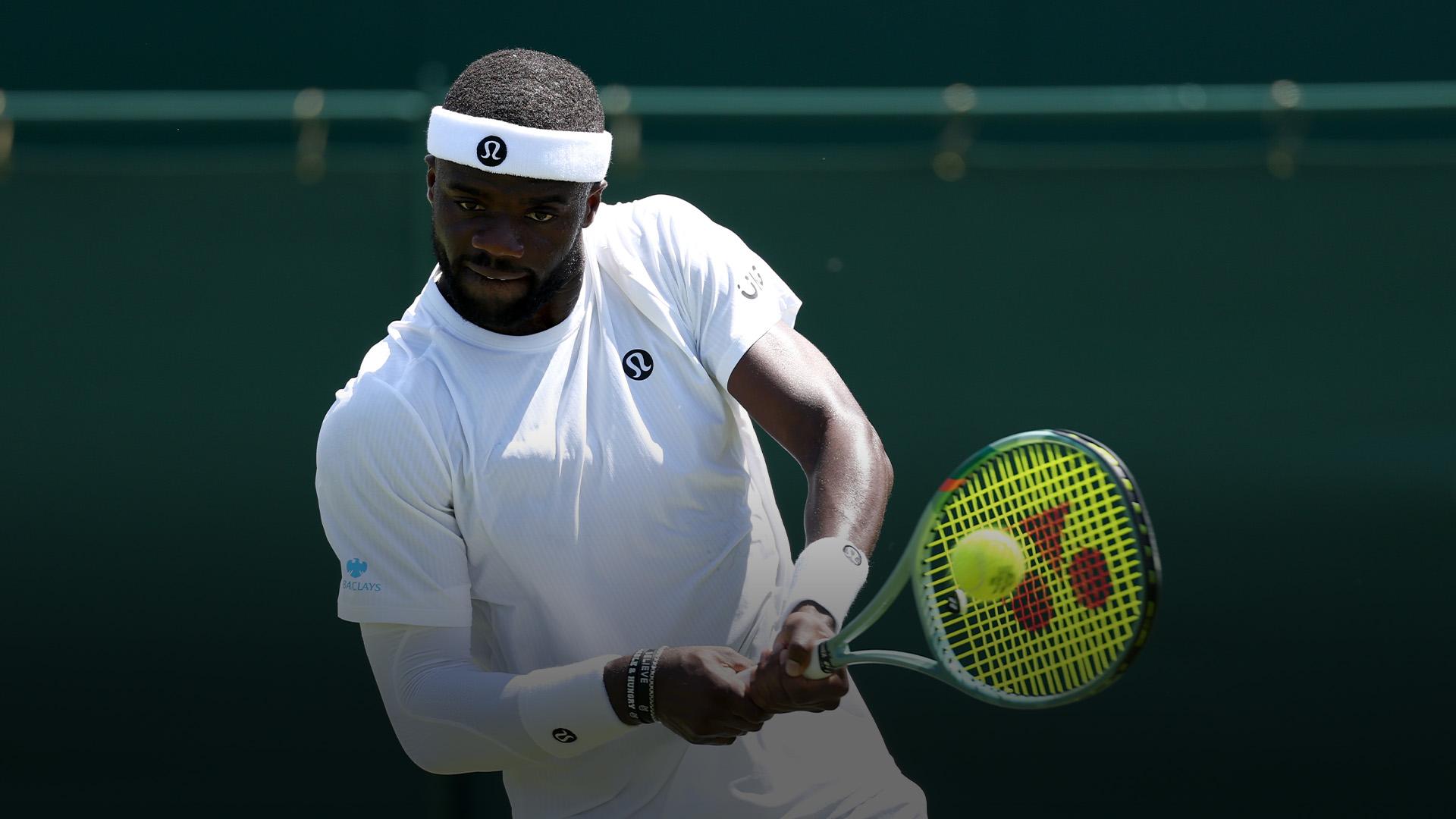 Frances Tiafoe advances in straight sets at Wimbledon