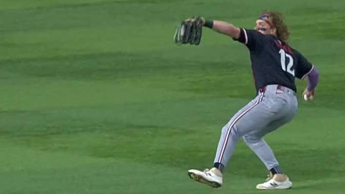 Harrison Bader's laser throw gets the out at home