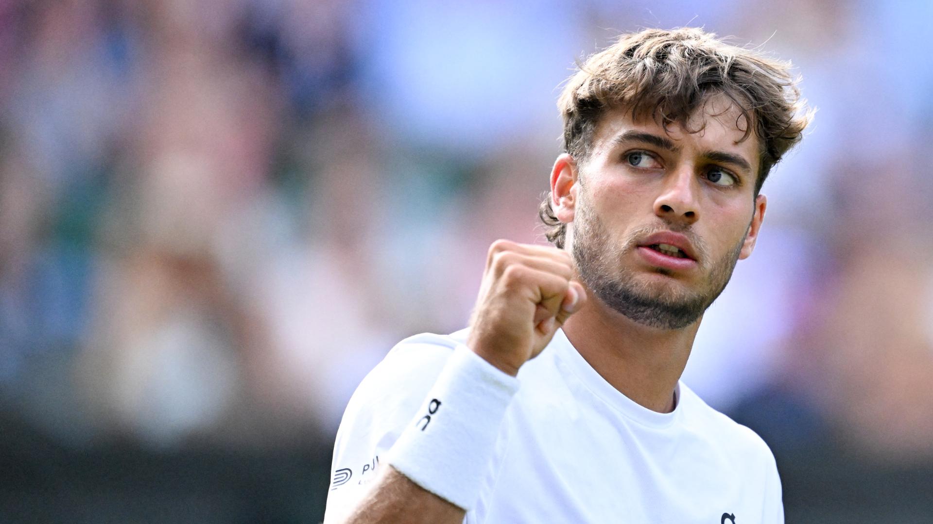 Cobolli takes first set off Djokovic in quarters
