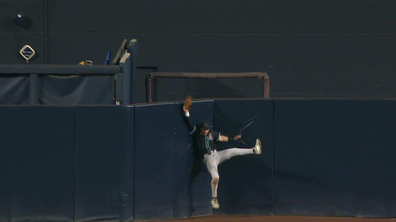 Jake McCarthy leaps at wall to rob HR from Fernando Tatis Jr.