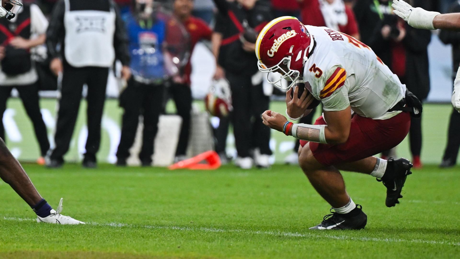 Rocco Becht dives into the end zone for a Cyclones TD