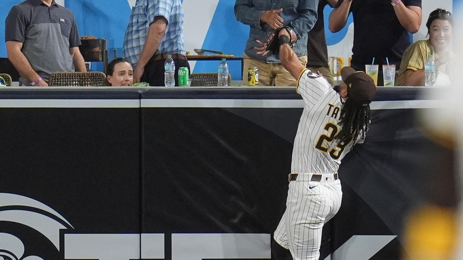 'He did it again' Tatis scales wall for HR-robbery