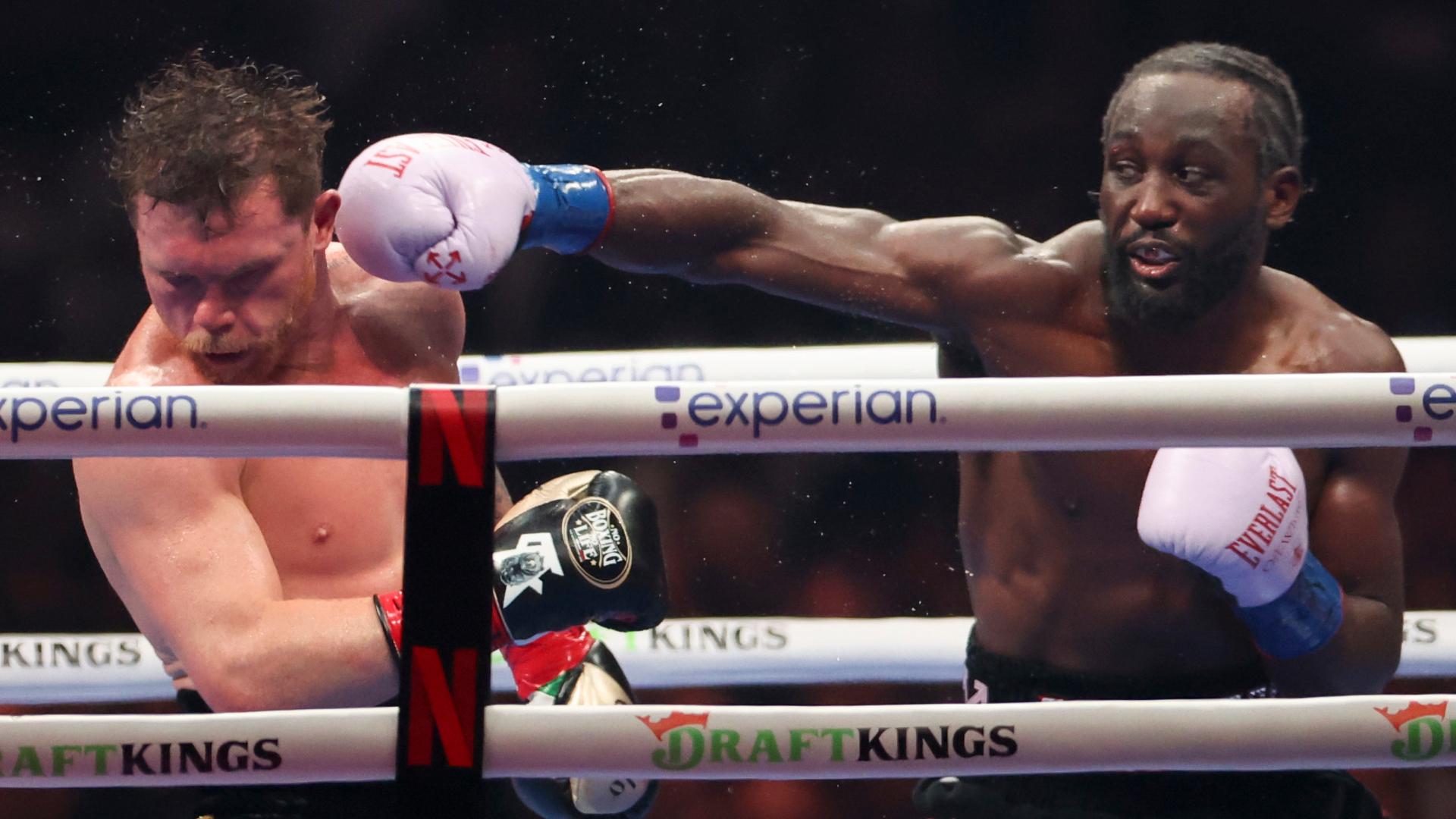 Crawford tops Canelo to make boxing history