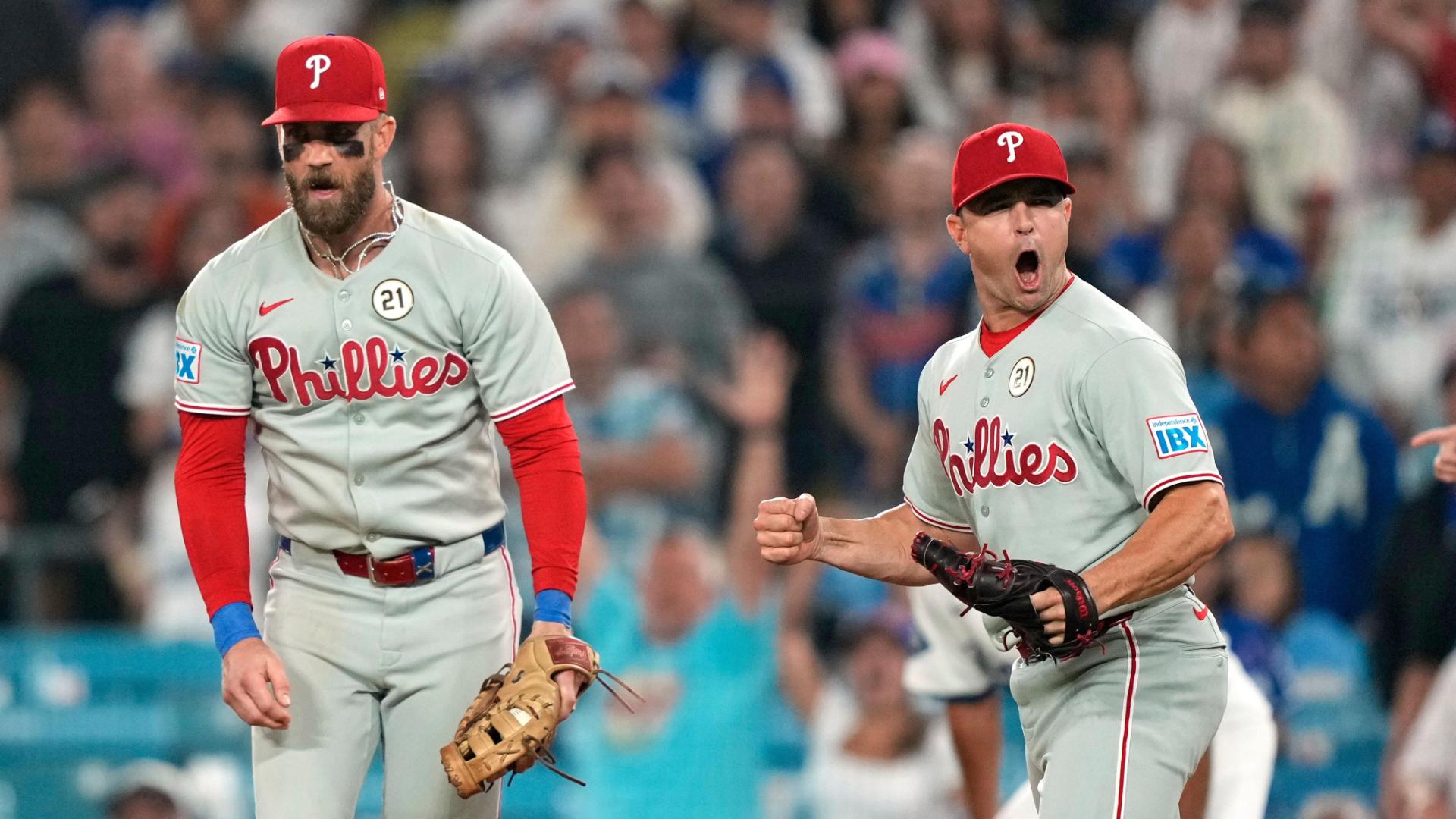 Phillies escape bases-loaded jam to clinch NL East