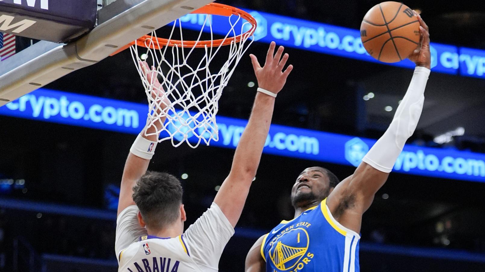 Kuminga posterizes LaRavia for the Warriors