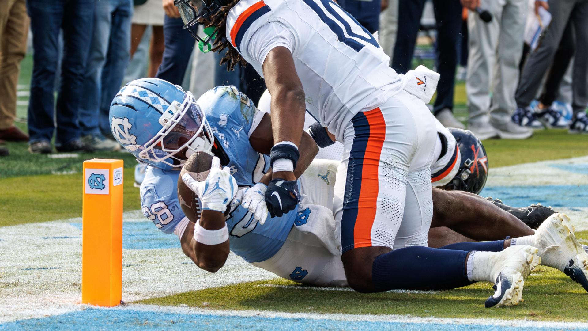 Virginia wins in OT as UNC’s 2-point attempt comes up just short