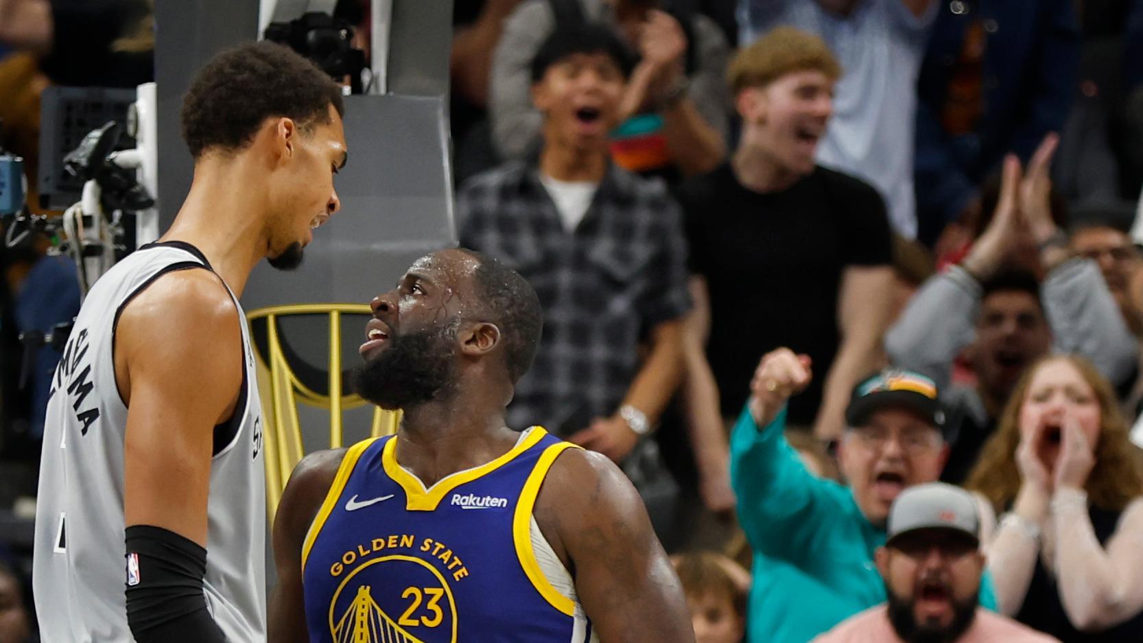 Wemby dunks on Draymond and let's him hear it