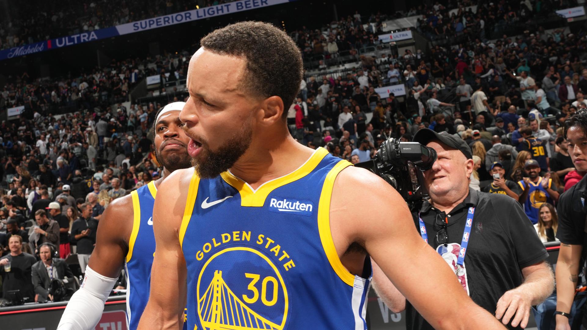 Curry stays hot on 49-point night in Warriors win