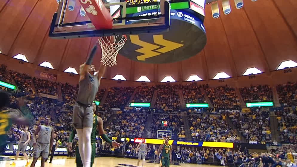Matthews increases WVU's lead with a dunk