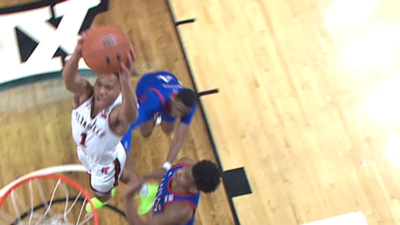 Texas Tech's Shannon weaves around defender for the dunk
