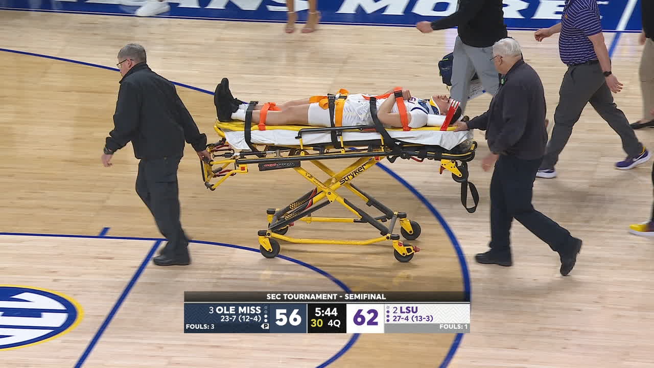 LSU's Last-Tear Poa gets carted off after hitting the floor