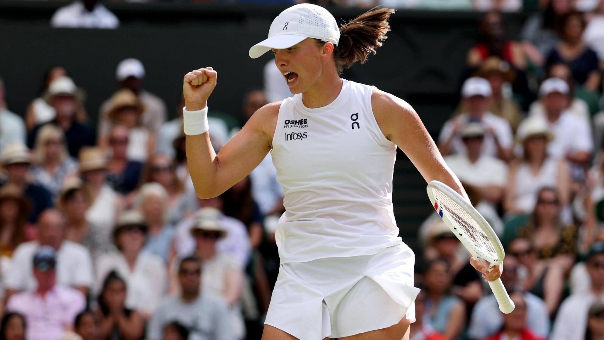 Swiatek wins 1st Wimbledon trophy with clean sweep over Anisimova