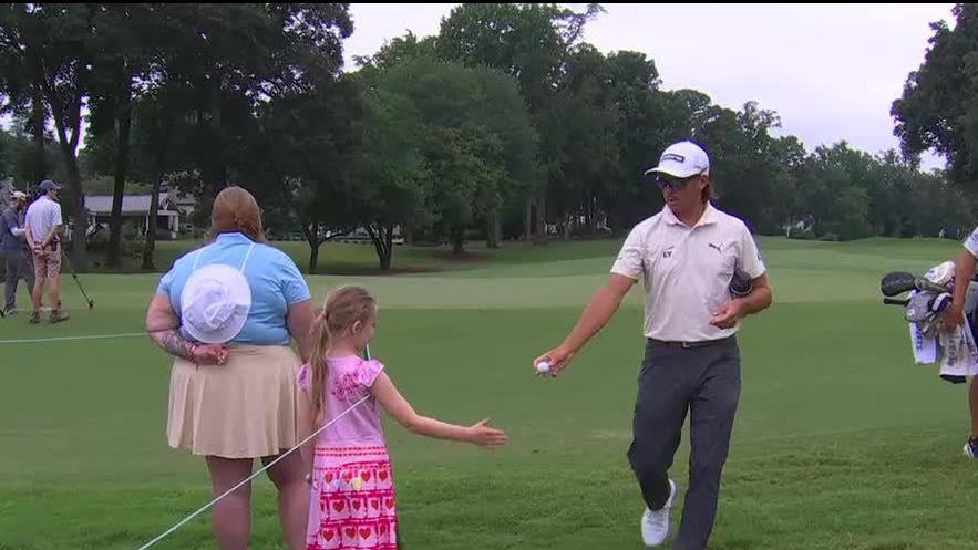 Rickie Fowler makes young fan's day at Wyndham Championship