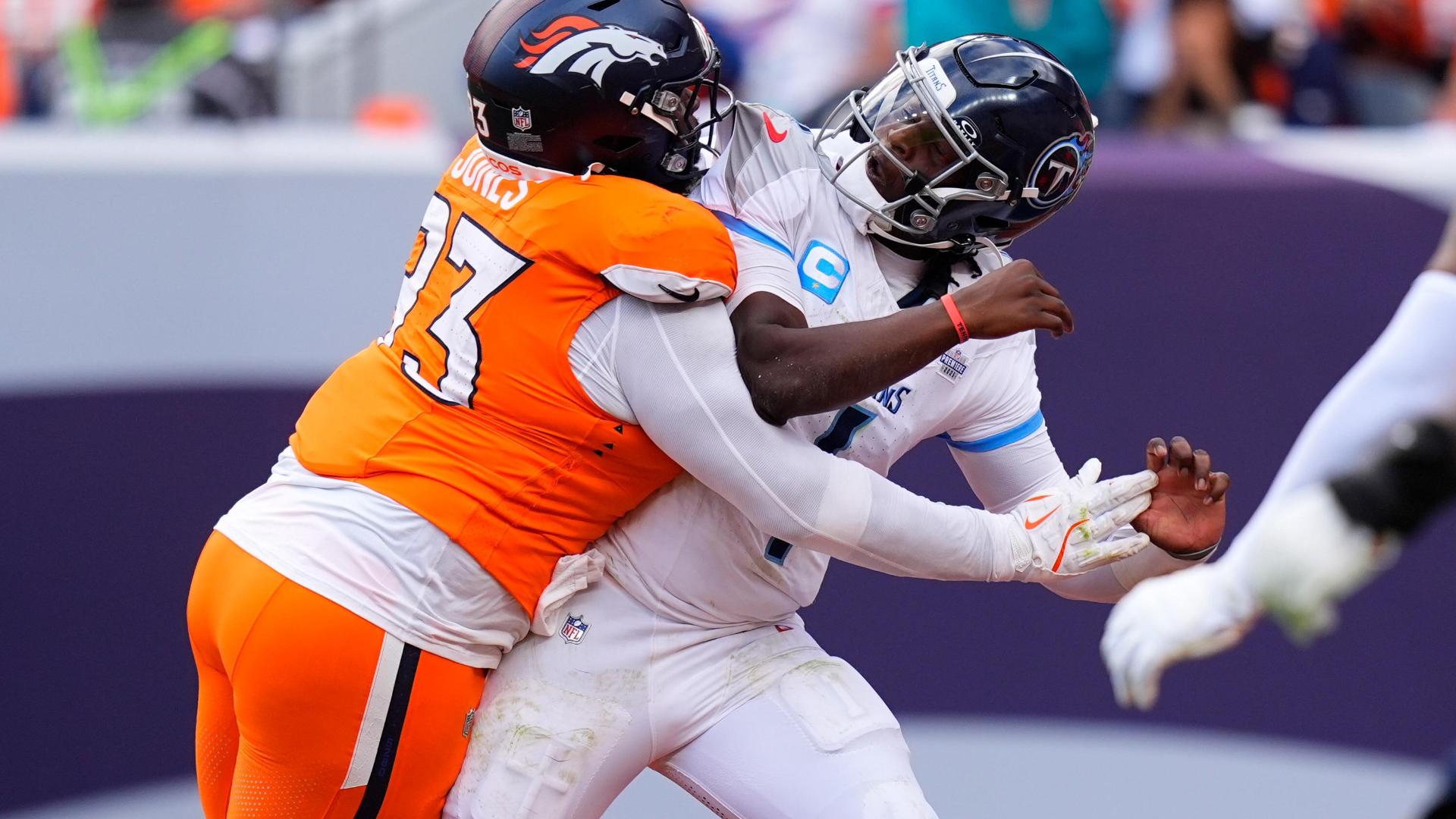 Broncos sack Cam Ward, recover his fumble to seal win