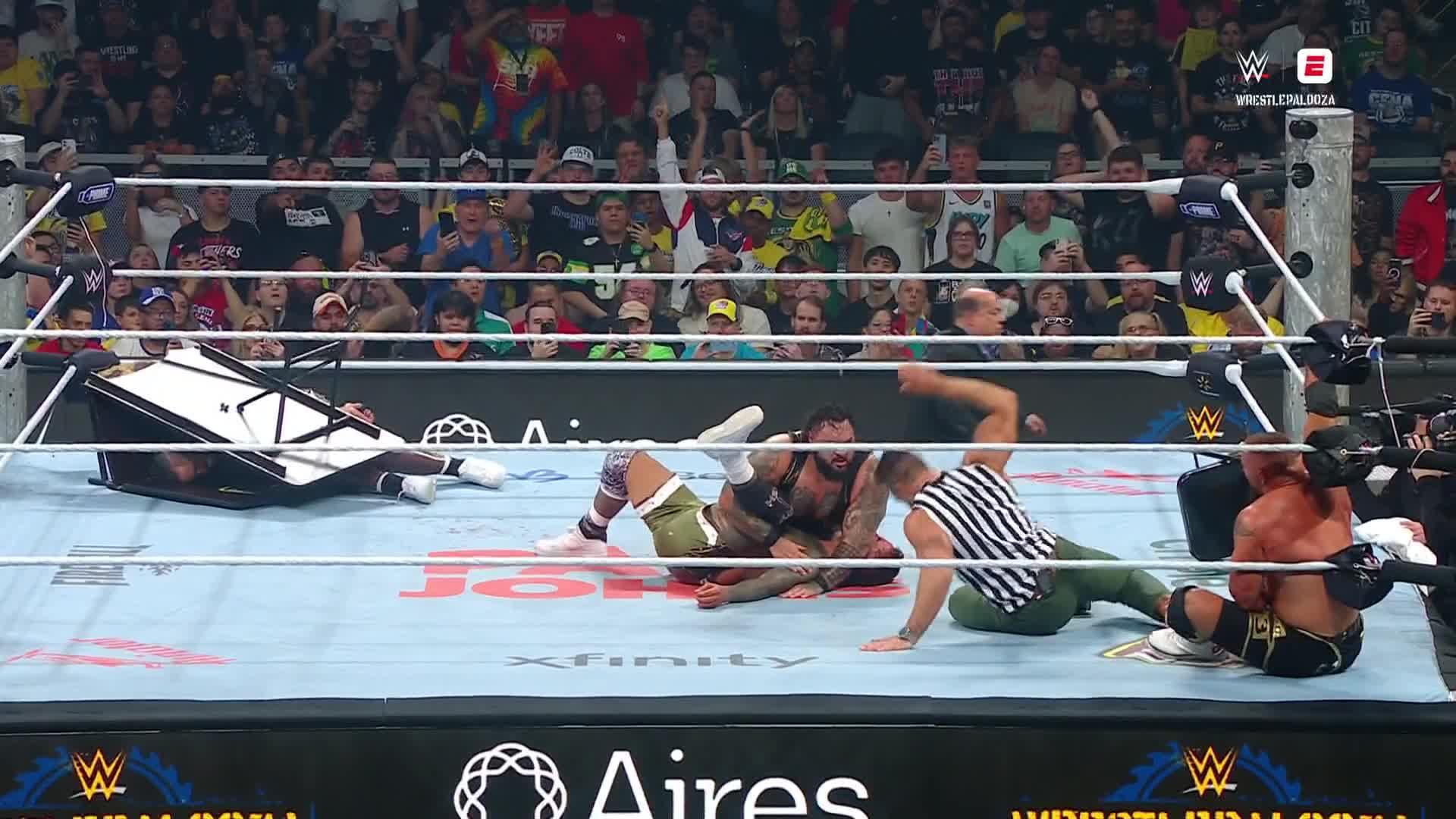 The Vision defeat Jimmy and Jey Uso
