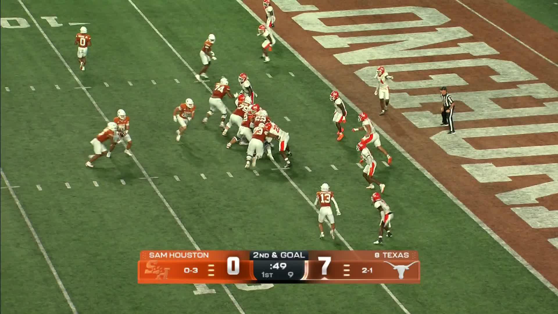 Arch Manning stands over defender after his rushing TD