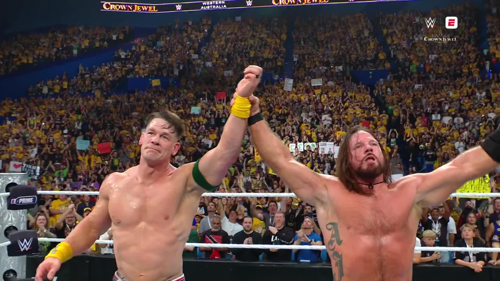 John Cena, AJ Styles embrace after a classic match