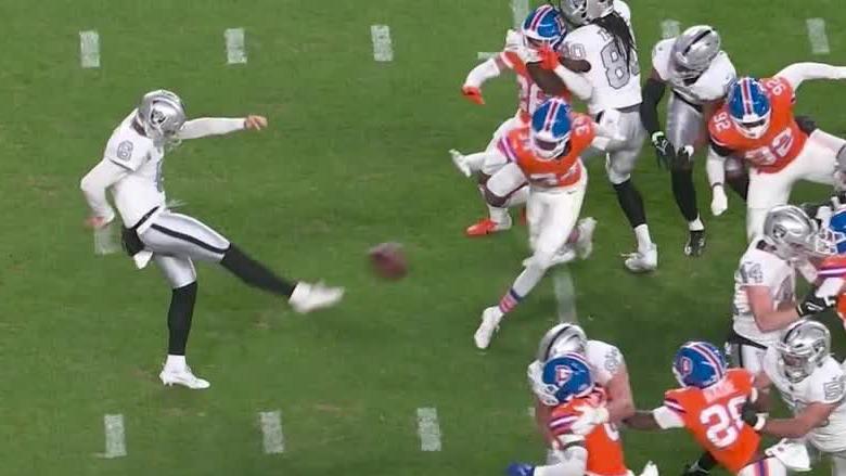 JL Skinner's helmet blocks Raiders' punt