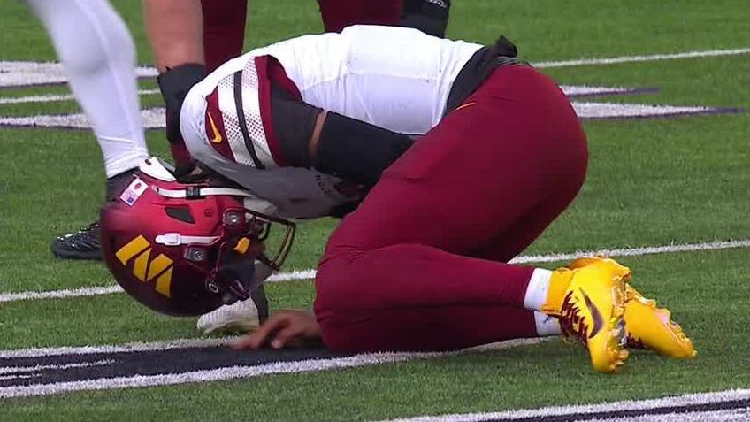 Jayden Daniels throws INT, exits game after elbow injury